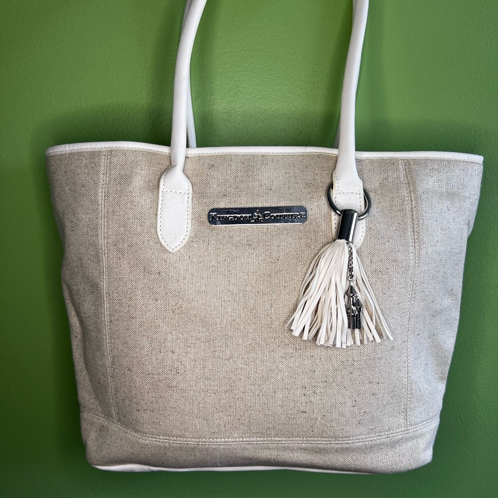 Disney Kingdom Couture tote in linen with Cinderella's castle tassel.